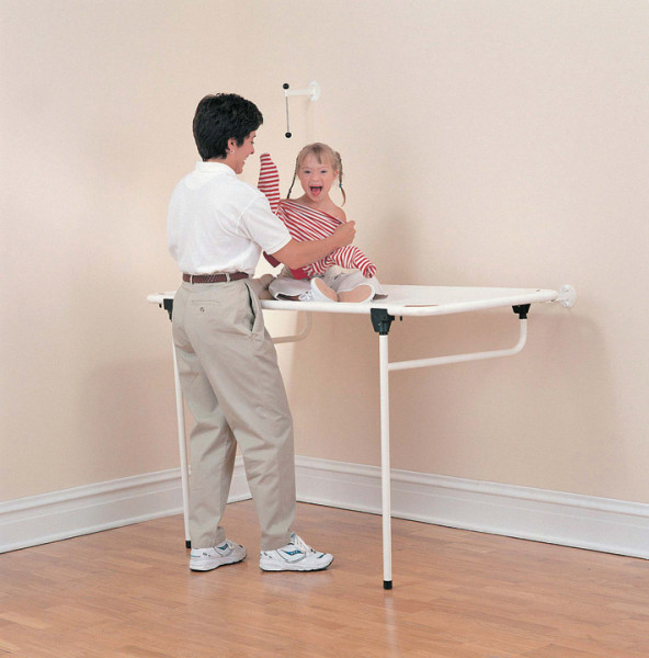 Camilla de ducha abatible y cambiador