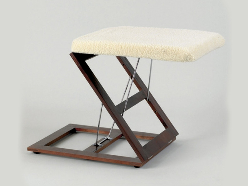 Reposapiernas plegable